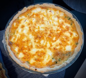 A round spinach and feta cheese pie. 